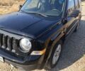Чорний Джип Patriot, об'ємом двигуна 2 л та пробігом 180 тис. км за 11900 $, фото 1 на Automoto.ua