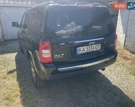 Черный Джип Патриот, объемом двигателя 2.36 л и пробегом 157 тыс. км за 11300 $, фото 2 на Automoto.ua