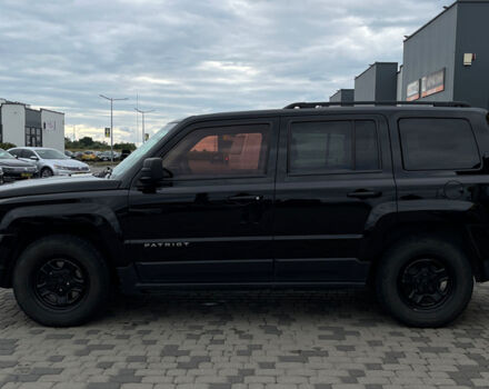 Черный Джип Патриот, объемом двигателя 2.4 л и пробегом 200 тыс. км за 9800 $, фото 3 на Automoto.ua