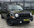 Черный Джип Патриот, объемом двигателя 2.4 л и пробегом 200 тыс. км за 9800 $, фото 1 на Automoto.ua
