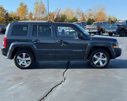 Черный Джип Патриот, объемом двигателя 2.4 л и пробегом 73 тыс. км за 5700 $, фото 2 на Automoto.ua