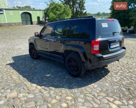 Черный Джип Патриот, объемом двигателя 2.36 л и пробегом 210 тыс. км за 8400 $, фото 9 на Automoto.ua