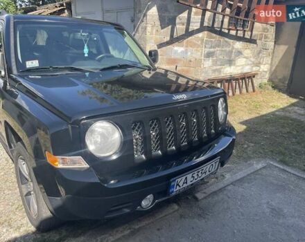 Черный Джип Патриот, объемом двигателя 2.36 л и пробегом 157 тыс. км за 11300 $, фото 1 на Automoto.ua