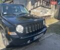 Черный Джип Патриот, объемом двигателя 2.36 л и пробегом 157 тыс. км за 11300 $, фото 1 на Automoto.ua