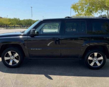 Черный Джип Патриот, объемом двигателя 2.4 л и пробегом 72 тыс. км за 5800 $, фото 3 на Automoto.ua