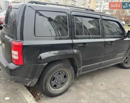 Черный Джип Патриот, объемом двигателя 2.36 л и пробегом 195 тыс. км за 8900 $, фото 1 на Automoto.ua