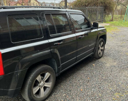 Черный Джип Патриот, объемом двигателя 2.36 л и пробегом 167 тыс. км за 10200 $, фото 3 на Automoto.ua