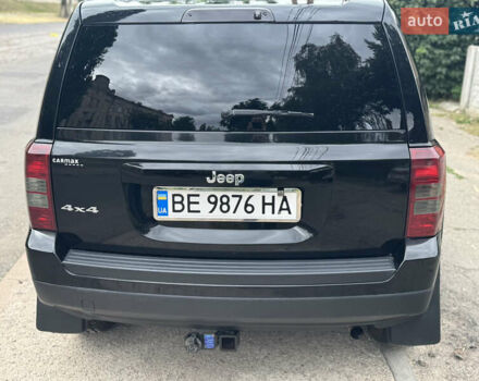 Черный Джип Патриот, объемом двигателя 2.4 л и пробегом 146 тыс. км за 11000 $, фото 2 на Automoto.ua
