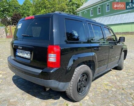 Черный Джип Патриот, объемом двигателя 2.36 л и пробегом 210 тыс. км за 8400 $, фото 7 на Automoto.ua