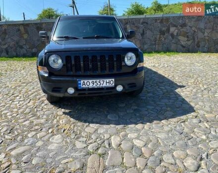 Черный Джип Патриот, объемом двигателя 2.36 л и пробегом 210 тыс. км за 8400 $, фото 3 на Automoto.ua