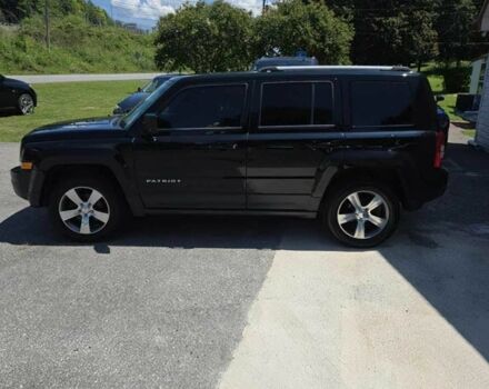 Чорний Джип Patriot, об'ємом двигуна 2.4 л та пробігом 70 тис. км за 7900 $, фото 2 на Automoto.ua