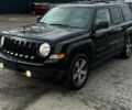 Чорний Джип Patriot, об'ємом двигуна 2.4 л та пробігом 84 тис. км за 8000 $, фото 1 на Automoto.ua