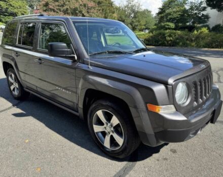 Черный Джип Патриот, объемом двигателя 2.4 л и пробегом 58 тыс. км за 7200 $, фото 1 на Automoto.ua