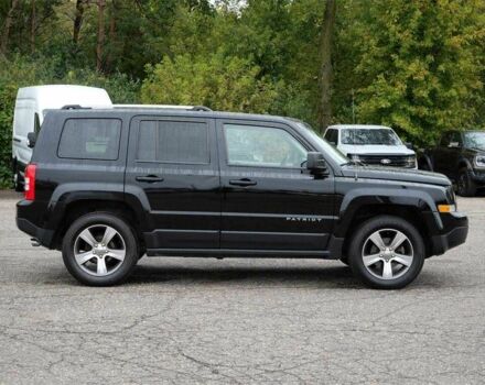 Черный Джип Патриот, объемом двигателя 2.4 л и пробегом 54 тыс. км за 4100 $, фото 5 на Automoto.ua
