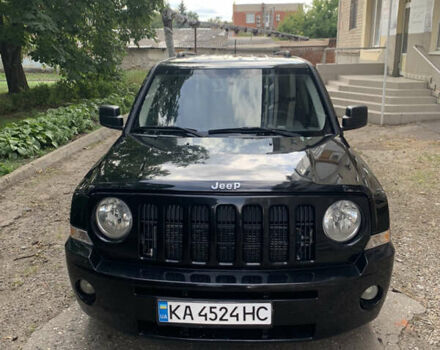 Черный Джип Патриот, объемом двигателя 2.36 л и пробегом 380 тыс. км за 5900 $, фото 1 на Automoto.ua