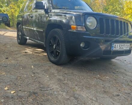 Чорний Джип Patriot, об'ємом двигуна 2 л та пробігом 240 тис. км за 8300 $, фото 1 на Automoto.ua