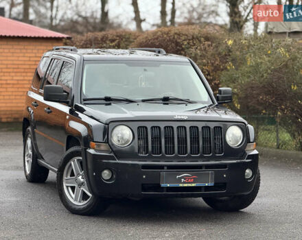Черный Джип Патриот, объемом двигателя 2.36 л и пробегом 150 тыс. км за 7900 $, фото 1 на Automoto.ua