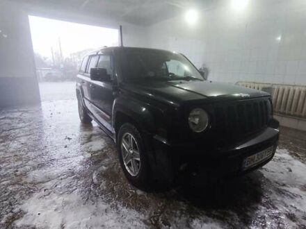 Черный Джип Патриот, объемом двигателя 2.14 л и пробегом 224 тыс. км за 10800 $, фото 1 на Automoto.ua
