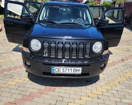 Чорний Джип Patriot, об'ємом двигуна 2.14 л та пробігом 226 тис. км за 10300 $, фото 1 на Automoto.ua
