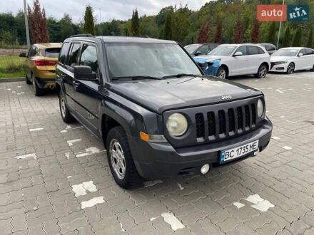 Чорний Джип Patriot, об'ємом двигуна 2 л та пробігом 253 тис. км за 6900 $, фото 1 на Automoto.ua