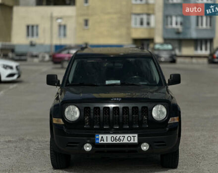 Черный Джип Патриот, объемом двигателя 2.36 л и пробегом 160 тыс. км за 7499 $, фото 1 на Automoto.ua