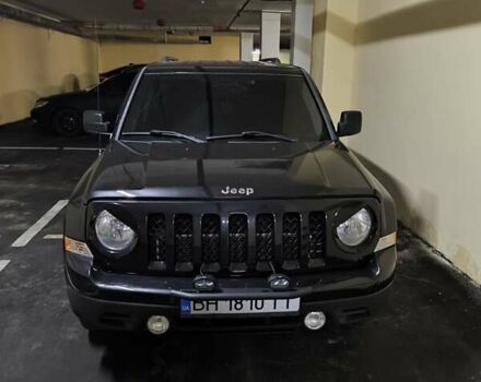 Чорний Джип Patriot, об'ємом двигуна 2.4 л та пробігом 60 тис. км за 10300 $, фото 1 на Automoto.ua