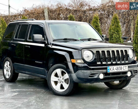 Черный Джип Патриот, объемом двигателя 2.4 л и пробегом 170 тыс. км за 7900 $, фото 1 на Automoto.ua