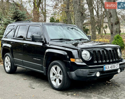 Черный Джип Патриот, объемом двигателя 2.36 л и пробегом 170 тыс. км за 9200 $, фото 1 на Automoto.ua