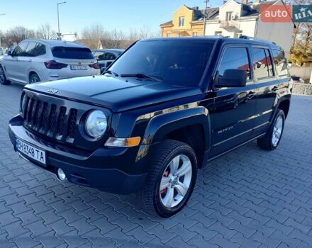 Черный Джип Патриот, объемом двигателя 2.36 л и пробегом 220 тыс. км за 12000 $, фото 1 на Automoto.ua
