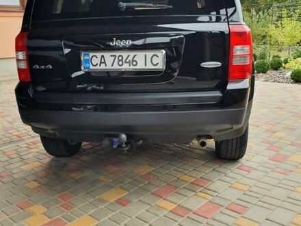 Черный Джип Патриот, объемом двигателя 2.36 л и пробегом 155 тыс. км за 10500 $, фото 1 на Automoto.ua