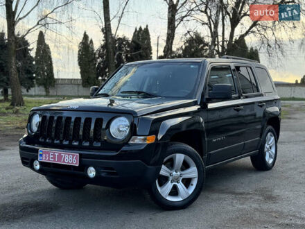 Чорний Джип Patriot, об'ємом двигуна 2.36 л та пробігом 283 тис. км за 8199 $, фото 1 на Automoto.ua