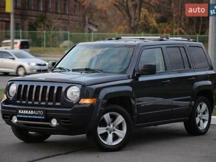 Черный Джип Патриот, объемом двигателя 2.36 л и пробегом 230 тыс. км за 9600 $, фото 1 на Automoto.ua