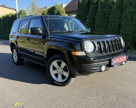 Черный Джип Патриот, объемом двигателя 2.4 л и пробегом 200 тыс. км за 9900 $, фото 1 на Automoto.ua