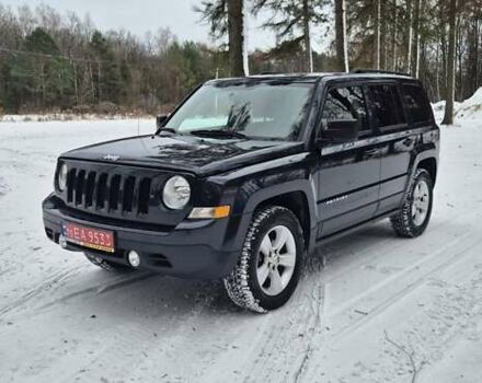 Чорний Джип Patriot, об'ємом двигуна 2.4 л та пробігом 157 тис. км за 9700 $, фото 1 на Automoto.ua