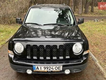 Чорний Джип Patriot, об'ємом двигуна 2.36 л та пробігом 157 тис. км за 9400 $, фото 1 на Automoto.ua