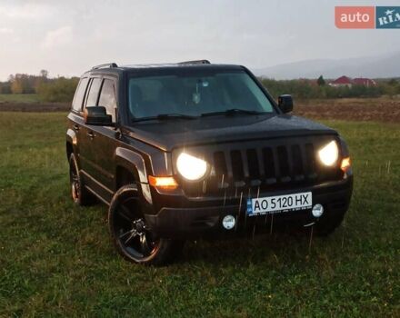 Черный Джип Патриот, объемом двигателя 2 л и пробегом 135 тыс. км за 9900 $, фото 1 на Automoto.ua
