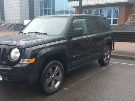 Черный Джип Патриот, объемом двигателя 2.36 л и пробегом 180 тыс. км за 9700 $, фото 1 на Automoto.ua