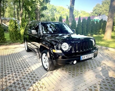 Чорний Джип Patriot, об'ємом двигуна 2.4 л та пробігом 120 тис. км за 10000 $, фото 1 на Automoto.ua