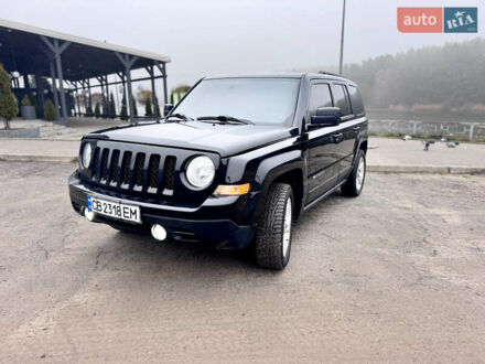Черный Джип Патриот, объемом двигателя 2.36 л и пробегом 189 тыс. км за 11700 $, фото 1 на Automoto.ua
