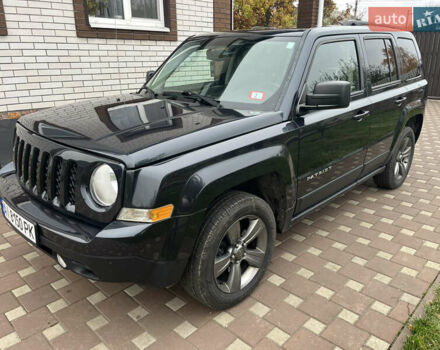 Черный Джип Патриот, объемом двигателя 2.36 л и пробегом 80 тыс. км за 10500 $, фото 1 на Automoto.ua