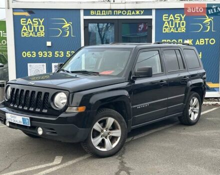 Черный Джип Патриот, объемом двигателя 2.36 л и пробегом 156 тыс. км за 9490 $, фото 1 на Automoto.ua