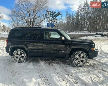 Чорний Джип Patriot, об'ємом двигуна 2.36 л та пробігом 180 тис. км за 10500 $, фото 1 на Automoto.ua