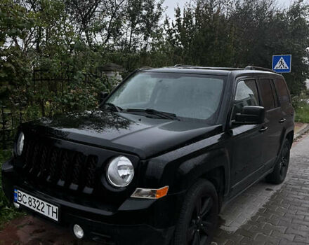 Чорний Джип Patriot, об'ємом двигуна 2 л та пробігом 157 тис. км за 10500 $, фото 1 на Automoto.ua