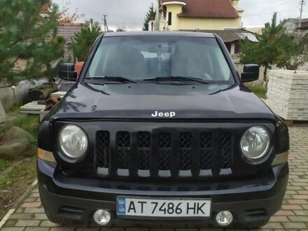 Черный Джип Патриот, объемом двигателя 2.36 л и пробегом 195 тыс. км за 8500 $, фото 1 на Automoto.ua