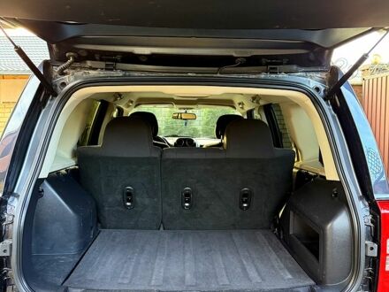 Черный Джип Патриот, объемом двигателя 2.4 л и пробегом 187 тыс. км за 9200 $, фото 1 на Automoto.ua