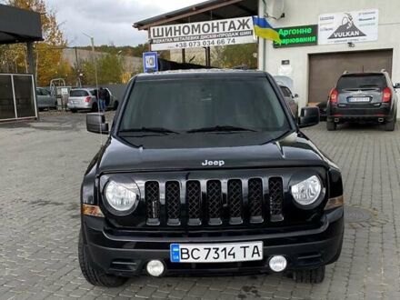 Черный Джип Патриот, объемом двигателя 2.36 л и пробегом 200 тыс. км за 9950 $, фото 1 на Automoto.ua