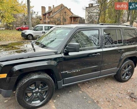 Чорний Джип Patriot, об'ємом двигуна 2.36 л та пробігом 188 тис. км за 12500 $, фото 1 на Automoto.ua