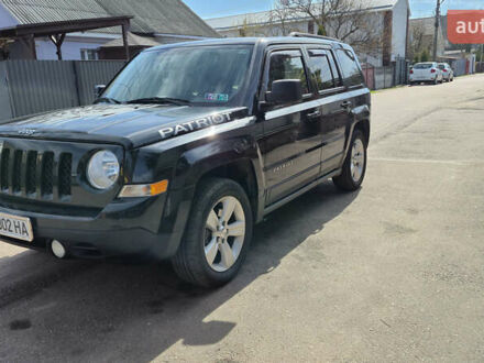 Джип Patriot 2015 у Житомирі на Automoto.ua Чорний Джип Patriot, об'ємом двигуна 2.36 л та пробігом 157 тис. км за 10497 $, фото 1 на Automoto.ua