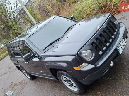 Черный Джип Патриот, объемом двигателя 2.36 л и пробегом 187 тыс. км за 10800 $, фото 1 на Automoto.ua