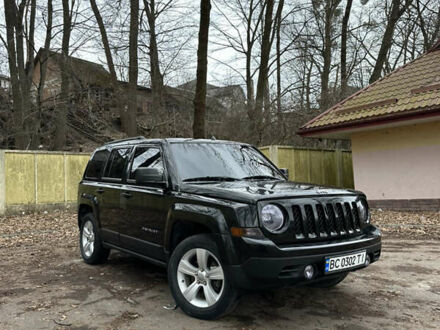 Черный Джип Патриот, объемом двигателя 2.36 л и пробегом 32 тыс. км за 11200 $, фото 1 на Automoto.ua